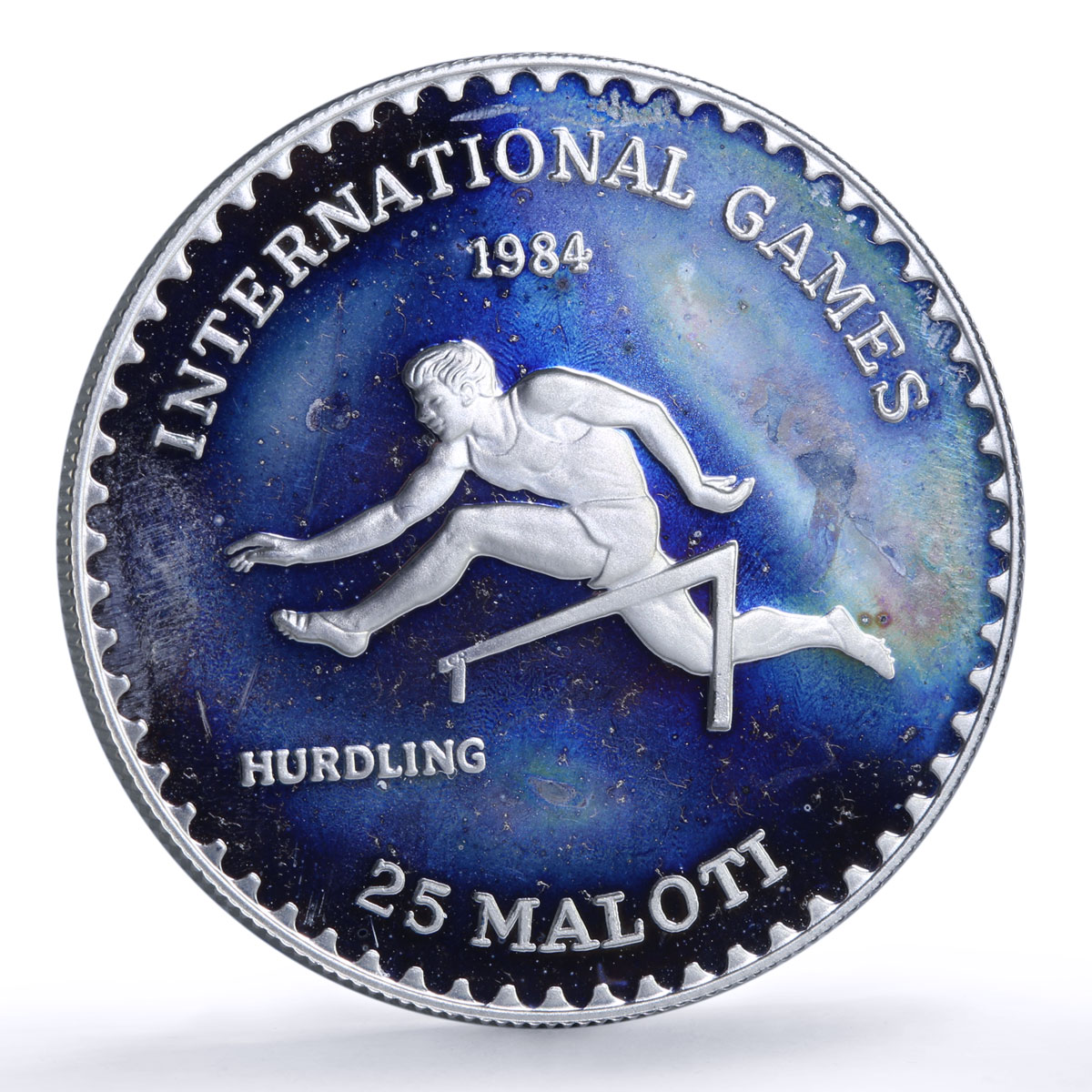 Lesotho 25 maloti Hurdling International Games Rainbow Toned silver coin 1984
