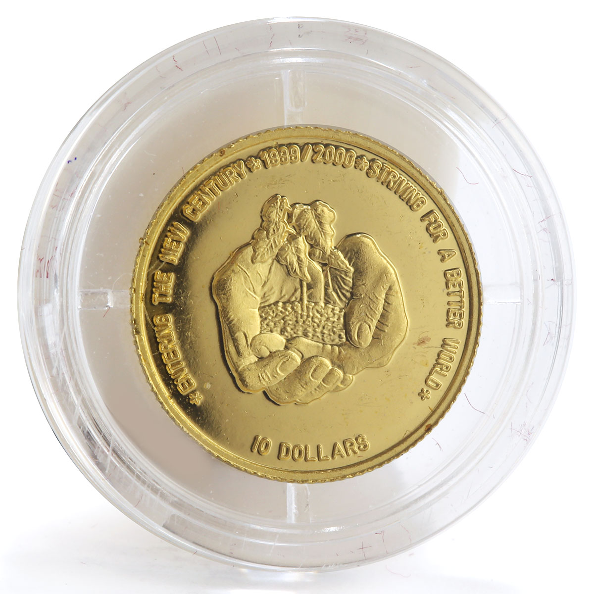 Niue 10 dollars Entering New Century Better World Sprout in palms gold coin 1999