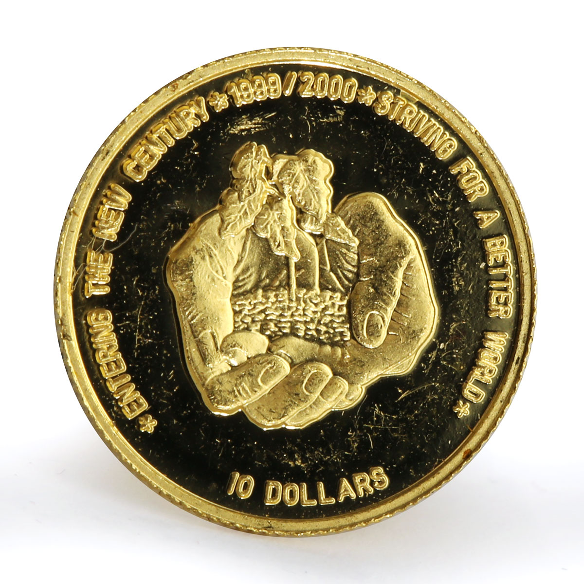 Niue 10 dollars Entering New Century Better World Sprout in palms gold coin 1999