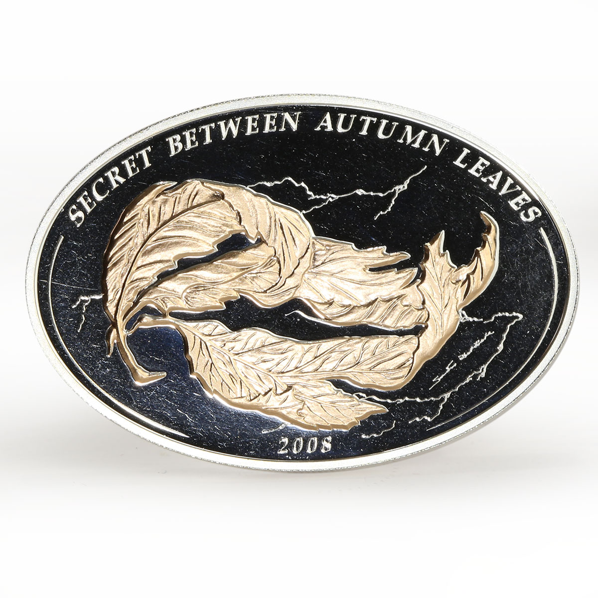 Palau $5 Secret between Autumn Leaves Oval Shaped Silver Coin 2008